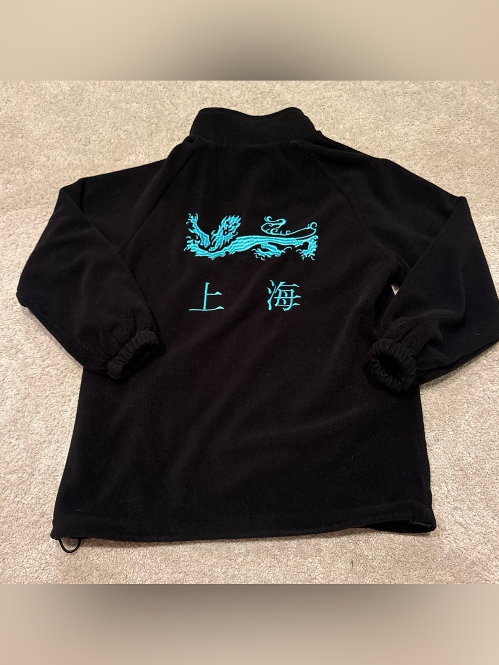 Black Fleece Zip Jacket with Teal Accents